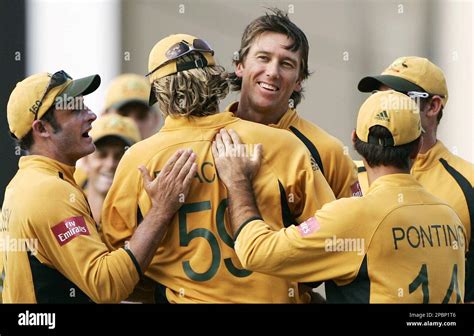 Australias Glenn Mcgrath Center Embraces Teammate Nathan Bracken