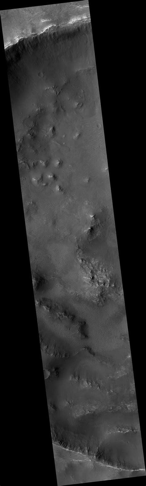 Exposed Fractured Bedrock In The Central Pit Of A Crater Nasa Jet