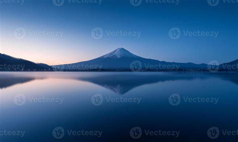 mountain Fuji at dawn with peaceful lake reflection 1396506 Stock Photo at Vecteezy