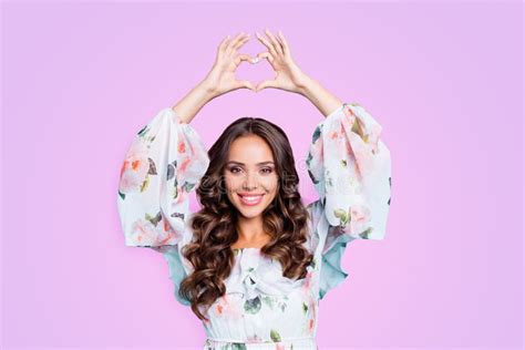 Portrait Of Good Looking Magnificent Exquisite Brunette Showing Love Symbol Heart Shape With