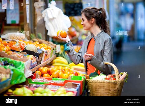 Woman Buying Fruits At Market Stock Photo Alamy