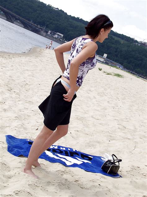 Smoking Nude At The Beach Photo