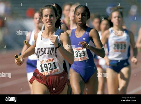 Austin Texas USA, 1998: High school girls' track & field; pack of 800 ...