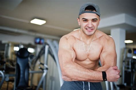 Fit And Muscular Arabian Man Doing Workouts In Gym Stock Photo Image