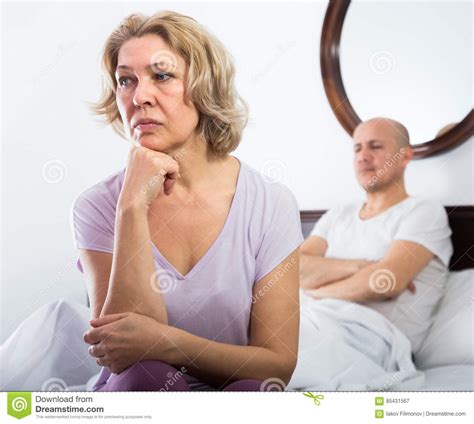 Mature Couple Having Quarrel In Bedroom Stock Image Image Of