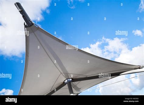 Awning In Sail Shape Under Cloudy Sky Background Stock Photo Alamy