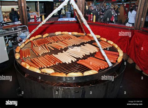 Barbecue Sausages On Swivel Grill Germany Stock Photo Alamy