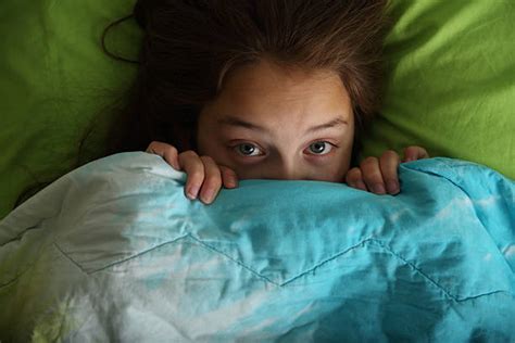 Best Scared Child In Bed Stock Photos Pictures And Royalty Free Images