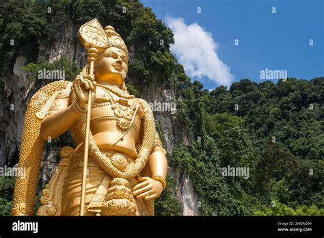 Giant Golden Statue Of Hindu God Lord Murugan Outside Entrance To Batu