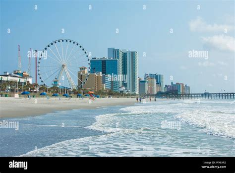 Resorts, ocean, and ferris wheel in Myrtle Beach, South Carolina Stock ...