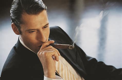 Rich-Man-Smoking-Cigar - Scents to ATTRACT MEN, Tips, Pheromones, Perfumes