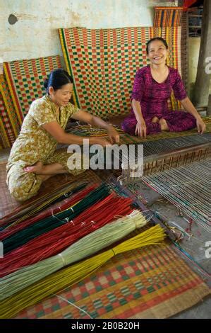 Vietnamese Women Weaving Mats At A Craft Factory In Hoi An Vietnam