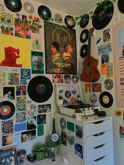 A Room Filled With Lots Of Different Types Of Records On The Wall And