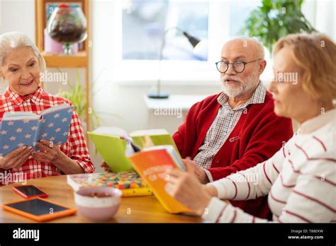 Mature Man Sitting Round Table Hi Res Stock Photography And Images Alamy