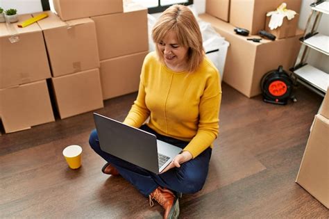 Premium Photo Middle Age Blonde Woman Smiling Happy Standing At New Home
