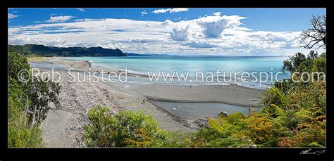 Motu River Mouth Panorama With People Fishing On Sand Bars For Kahawai