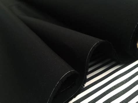 Monarch plain black solid fabric | Buy Online | Acorn Fabrics UK