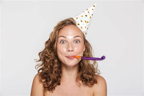 Premium Photo Surprised Half Naked Woman Wearing Party Cone Blowing