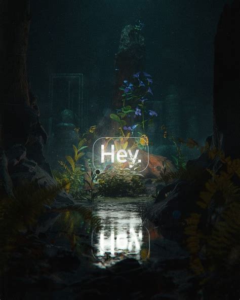 The Words Hey Are Lit Up In Front Of Some Plants And Water At Night Time