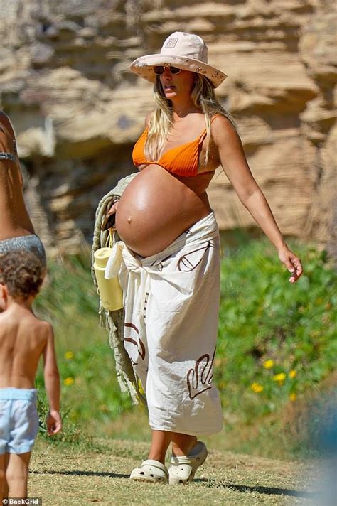 Renee Bargh Shows Off Her Huge Baby Bump In An Orange Bikini Trends Now