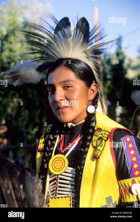 Native American Teenage Boy Dressed In Traditional Pow Wow Regalia On