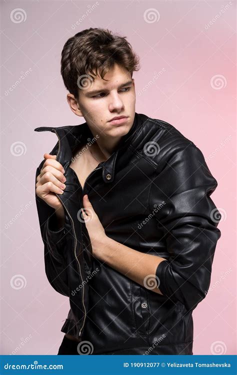 Handsome Athletic Male Model Wearing Leather Jacket On Naked Torso