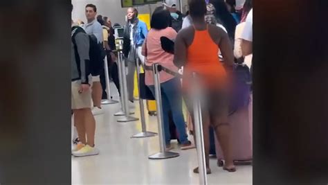 Spirit Airlines Passenger Stands In Line For Flight Naked From Waist