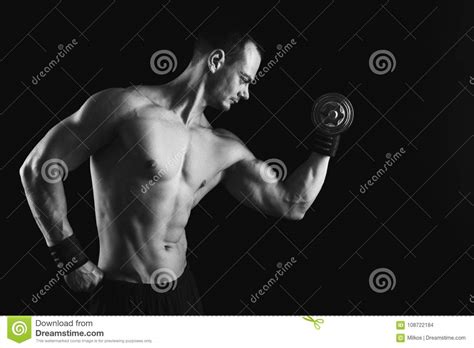 Strong Athletic Man With Dumbbell Showes Naked Muscular Body Stock Photo Image Of Naked