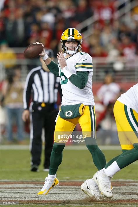 Quarterback Tim Boyle of the Green Bay Packers looks to pass the ball... | Green bay packers ...