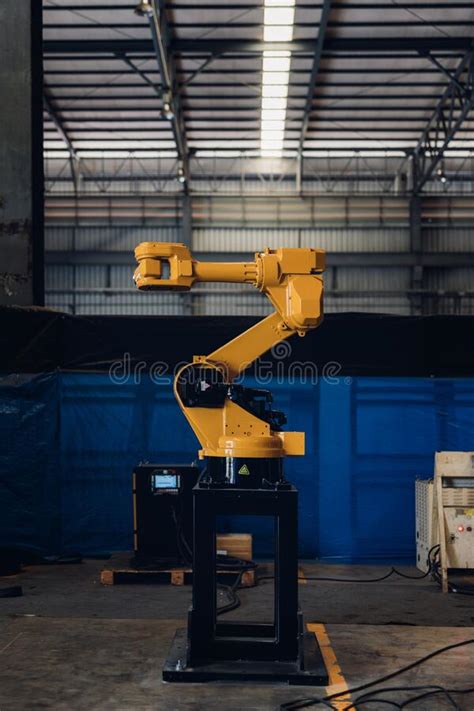 New Generation Robotic Arm Ready For Work On A Production Line Stock