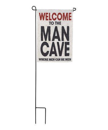 a sign that says welcome to the man cave