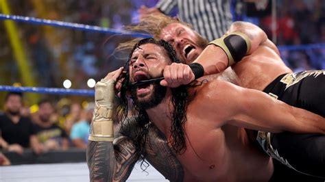 Edge Humiliates Roman Reigns Following Huge Six Man Tag Team Match On