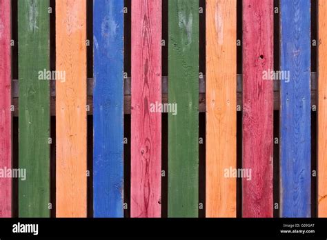 Colourful picket fence Stock Photo - Alamy