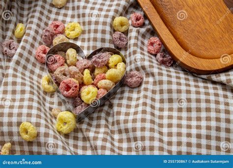 Healthy Breakfast Concept Colorful Ring Cereals In Heart Shape