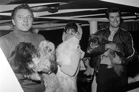 Richard Burton, Elizabeth Taylor, and Clint Eastwood during the filming ...