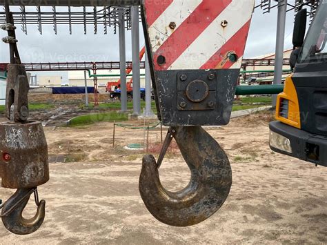 Lifting hook of a construction crane 15044345 Stock Photo at Vecteezy