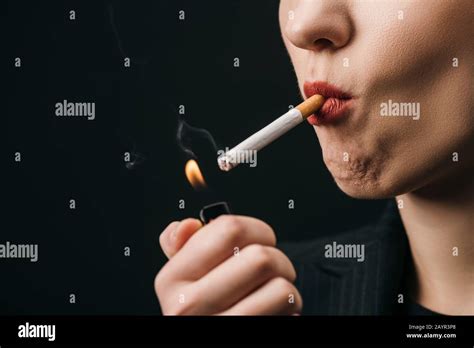 Woman Lighting Cigarette Hi Res Stock Photography And Images Alamy