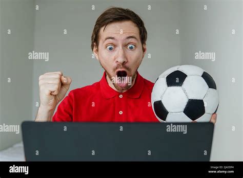 Young Excited Man Fan Support His Football Team Hold In Hand Soccer