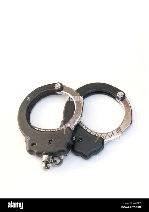 A Pair Of Black Asp Tactical Police Handcuffs Stock Photo Alamy