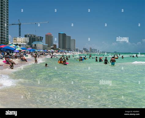 People enjoying the water and sun at Panama City Beach, Florida Stock Photo - Alamy