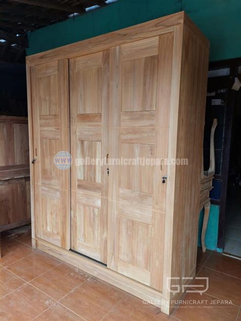 Lemari Pakaian Sleding Pintu Kayu Jati Finishing Melamic X Cm