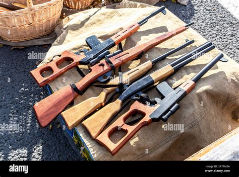 Different handmade wooden toy rifles, guns for children Stock Photo - Alamy