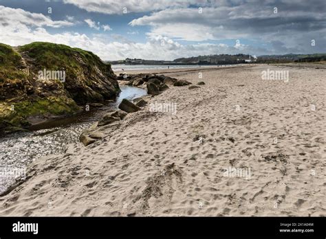 The Par Polmear River Flowing Towards The Sea At Par Beach In Cornwall