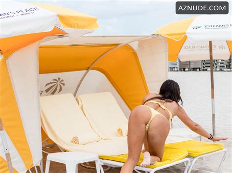 Claudia Romani Sexy On South Beach Wearing A Yellow And White Thong Bikini AZNude