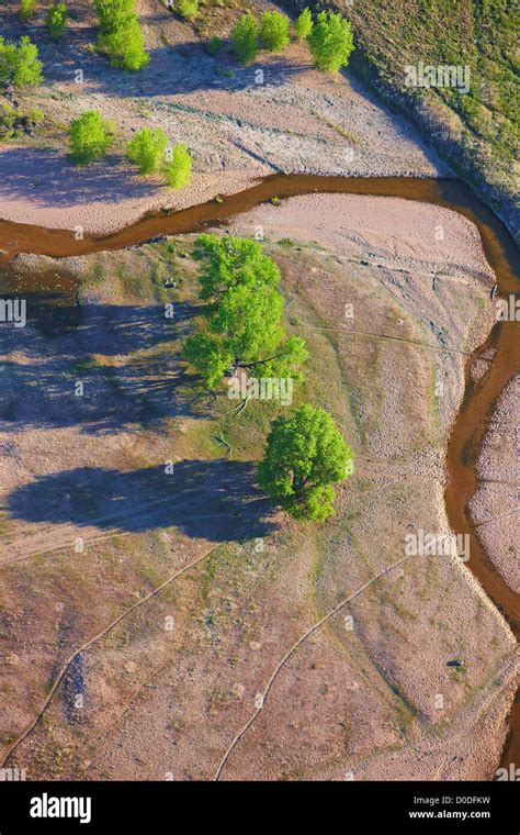 An Aerial View Of A Small Creek On Colorados Eastern Plains Stock