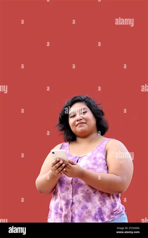 Year Old Fat Brunette Latina Woman Uses Her Cell Phone To Send