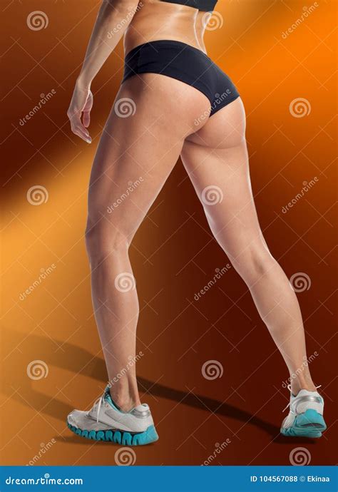 An Athletic Girl Shows Her In A Bikini At A Close Distance Stock Photo