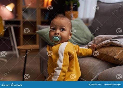 Cute Baby Boy with Binky Taking First Steps Stock Photo - Image of baby ...