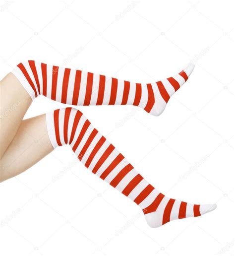 Woman Legs In Color Red And White Socks Isolated On White Stock Photo