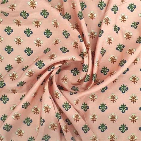 Peach Floral With Foil Print Rayon Fabric At Rs